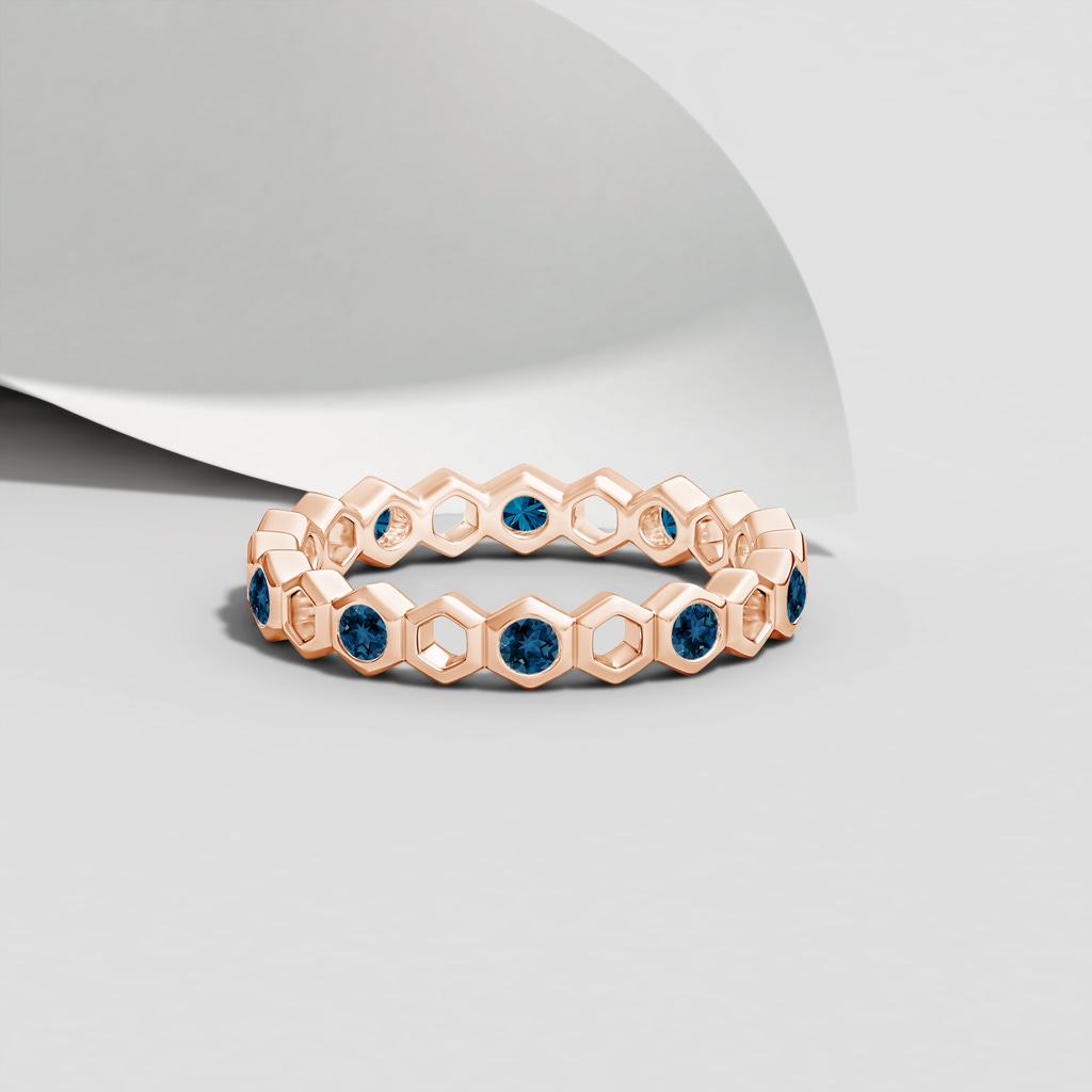 2mm AAA Natori x Angara Hexagonal Alternate London Blue Topaz Eternity Band in 70 Rose Gold Lifestyle