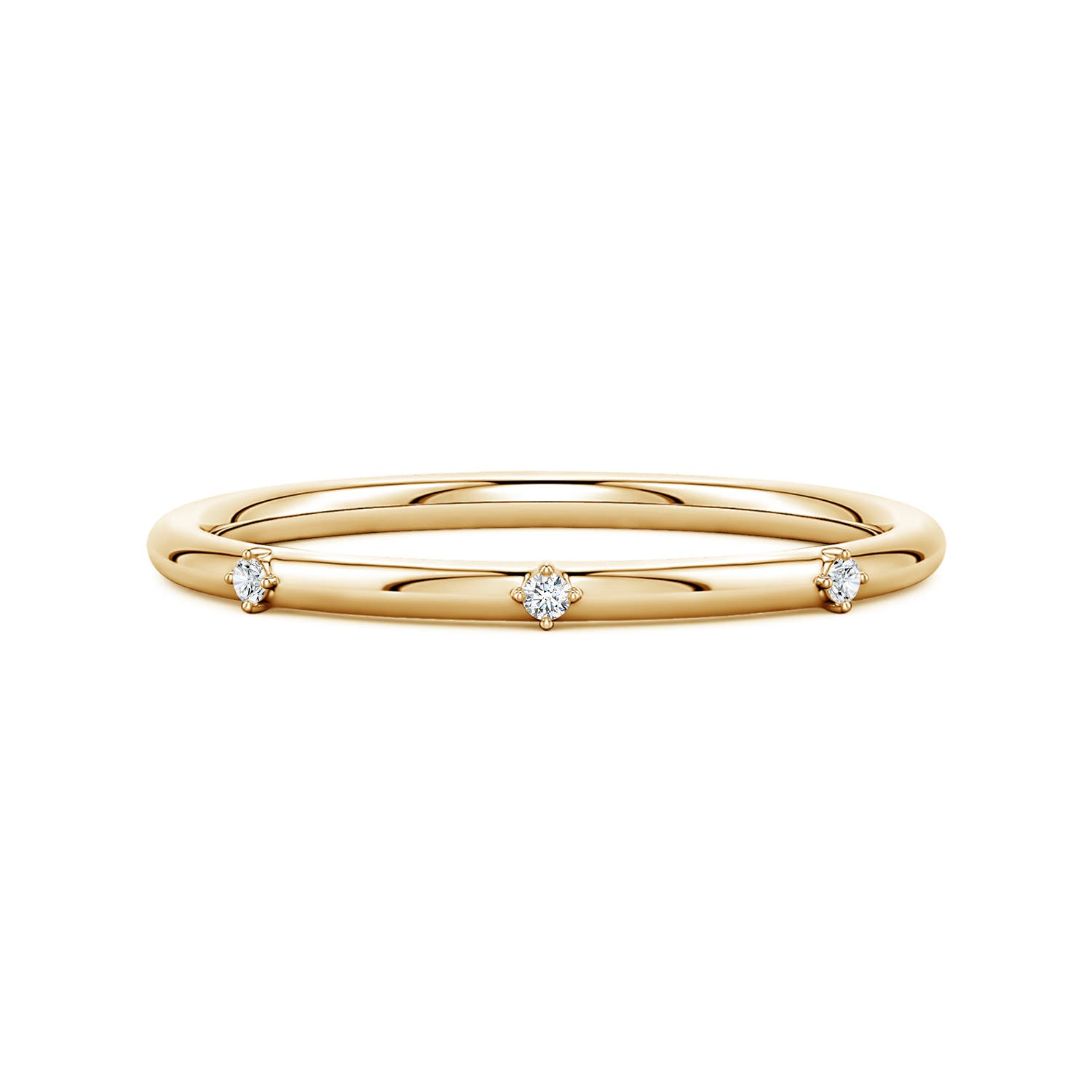 1.2mm GVS2 Round Diamond Three-Stone Station Ring in Yellow Gold
