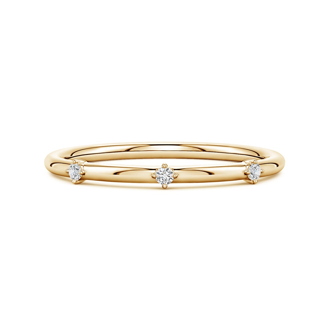 1.5mm HSI2 Round Diamond Three-Stone Station Ring in Yellow Gold