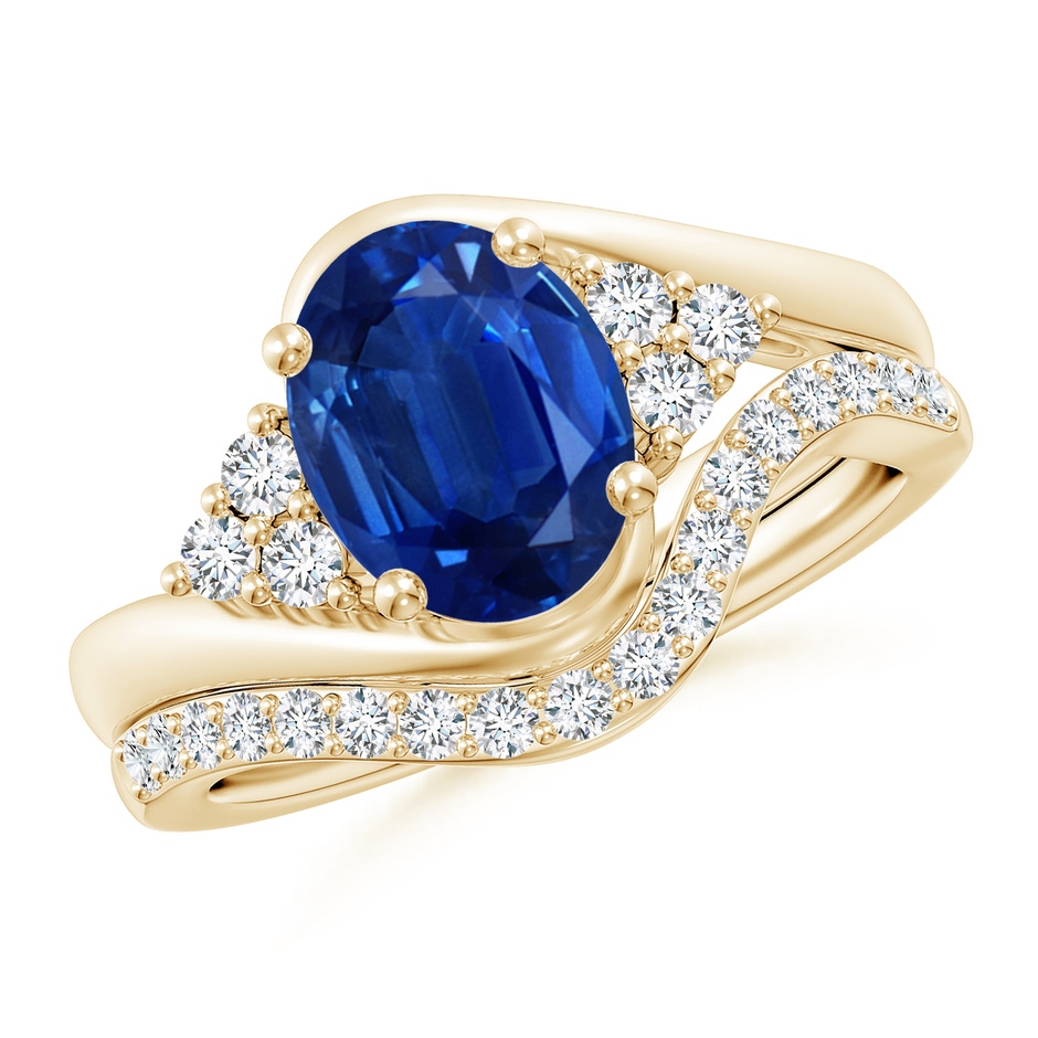 9x7mm AAA Oval Blue Sapphire Bypass Bridal Set with Diamonds in Yellow Gold 