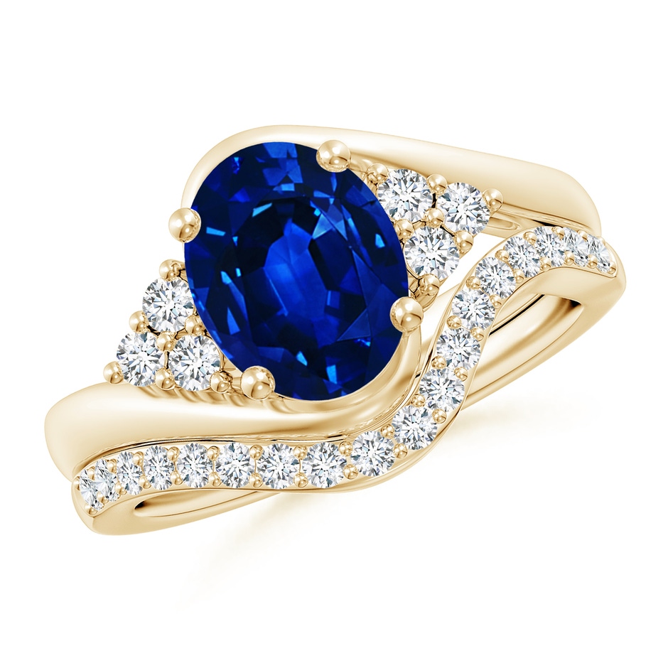 9x7mm AAAA Oval Blue Sapphire Bypass Bridal Set with Diamonds in Yellow Gold 