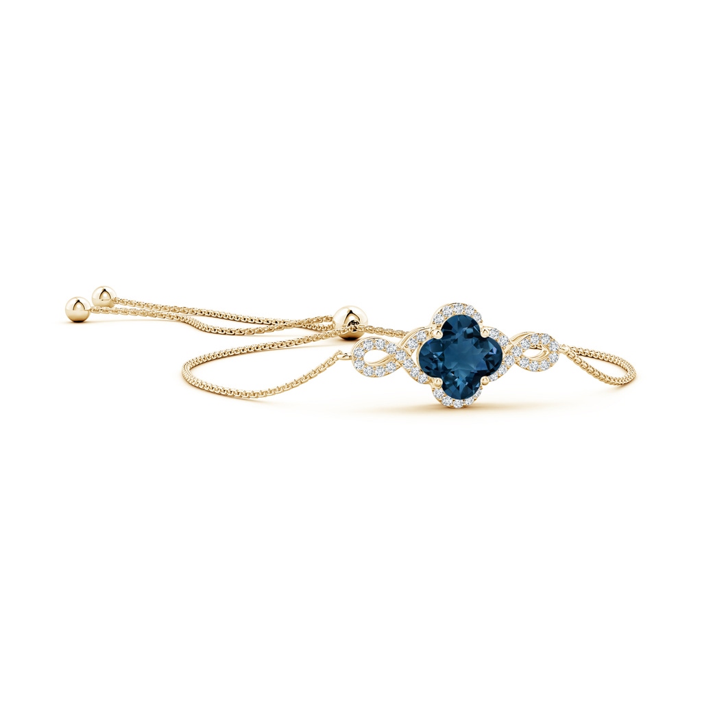 7mm AAAA Clover-Shaped London Blue Topaz Halo Infinity Bracelet in Yellow Gold