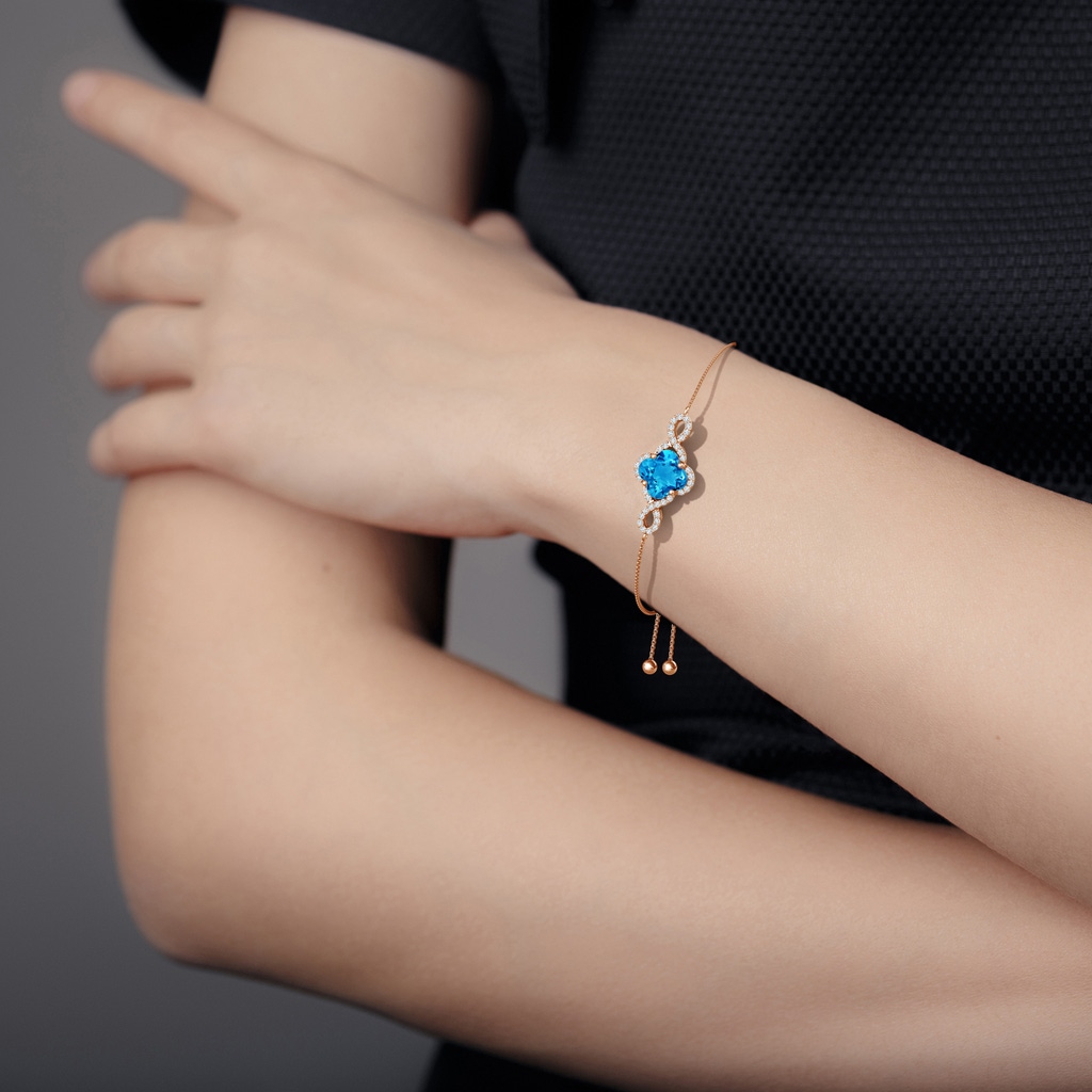 7mm AAAA Clover-Shaped Swiss Blue Topaz Halo Infinity Bracelet in Rose Gold Body-Bra