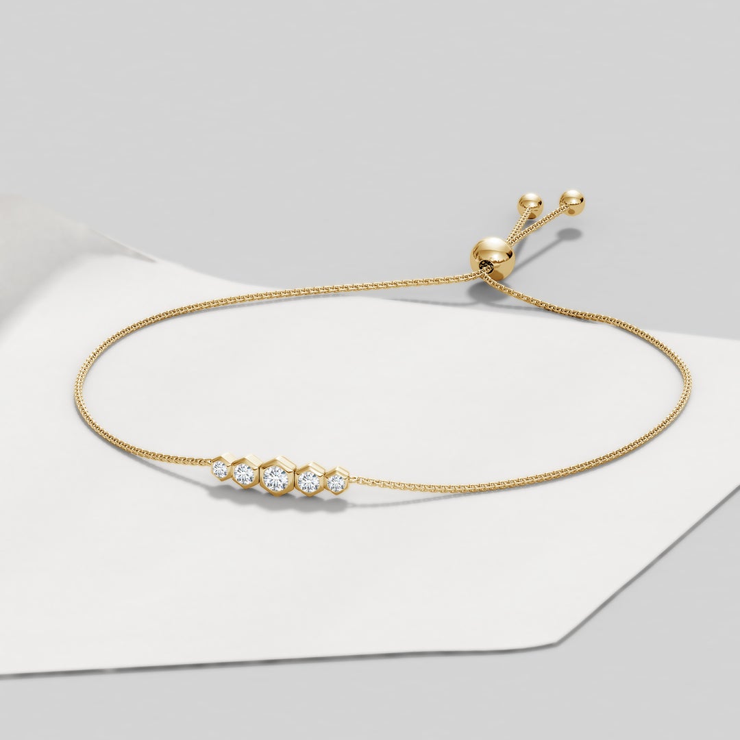3mm IJI1I2 Natori x Angara Hexagonal Frame 5 Bezel Set Diamond Indochine Journey Bracelet in Yellow Gold - lifestyle 3