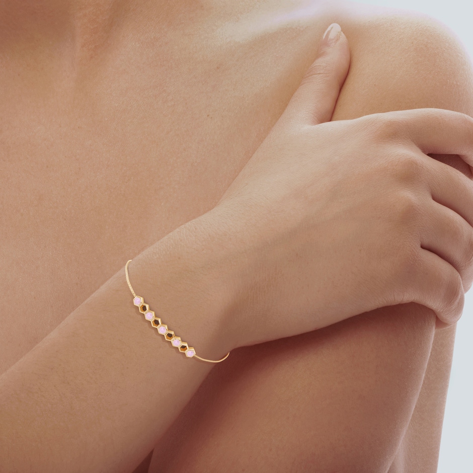 3mm AAA Natori x Angara Hexagonal Alternate Rose Quartz Bolo Bracelet in Yellow Gold body-hand