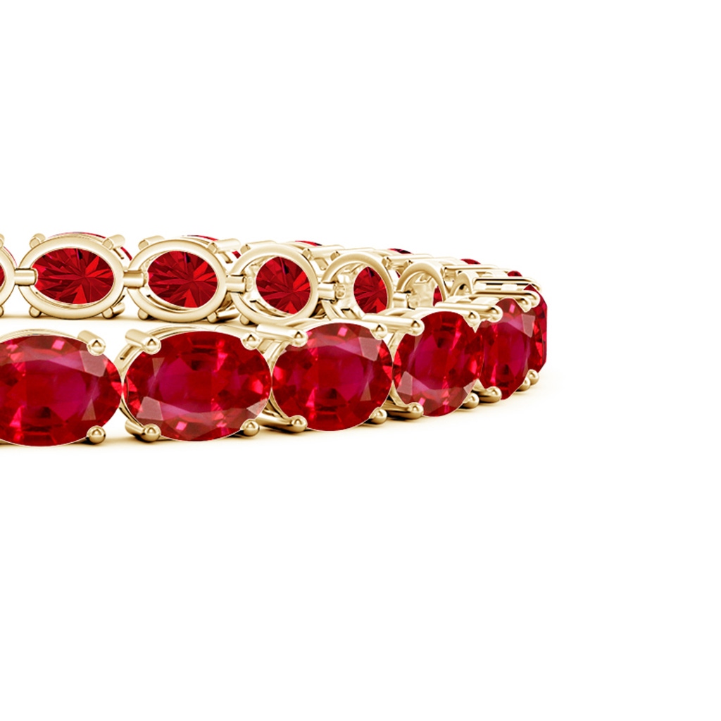 7x5mm AAA Classic Oval Ruby Tennis Link Bracelet in Yellow Gold Side 199