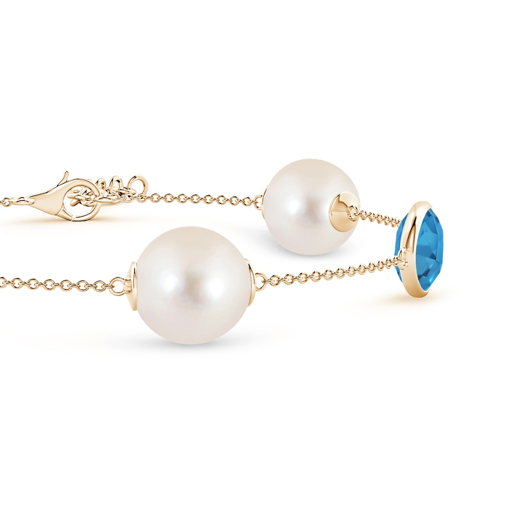 10mm AAAA Freshwater Pearl & Oval Swiss Blue Topaz Bracelet in Yellow Gold - side 1