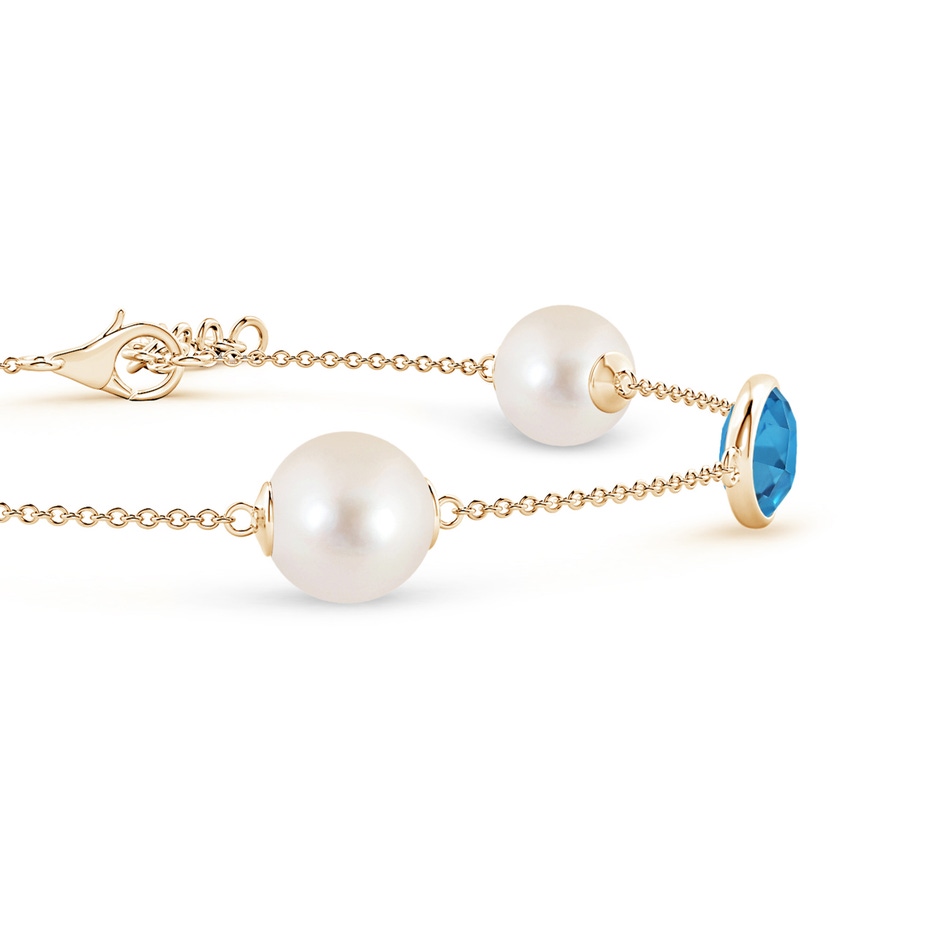 8mm AAAA Freshwater Pearl & Oval Swiss Blue Topaz Bracelet in Yellow Gold side 1