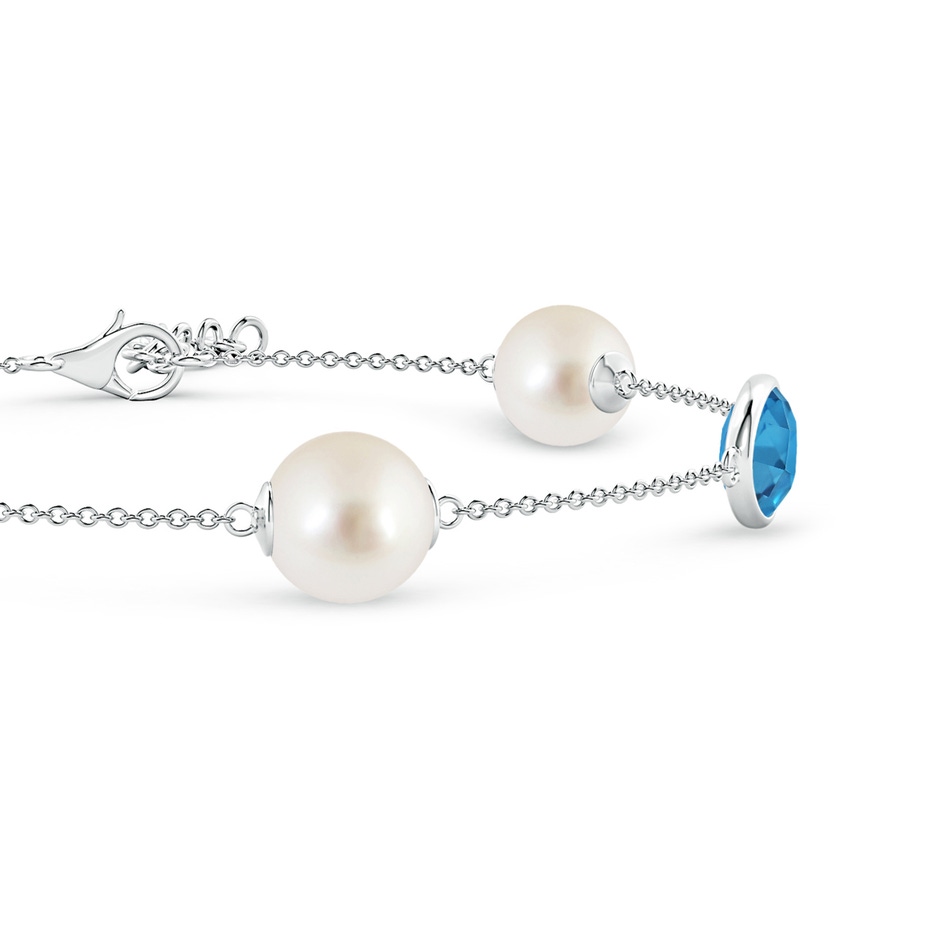 8mm AAAA South Sea Pearl & Oval Swiss Blue Topaz Bracelet in White Gold side 1