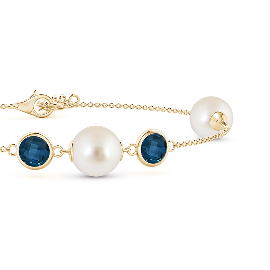 8mm AAAA South Sea Pearl and London Blue Topaz Bracelet in Yellow Gold Side 1