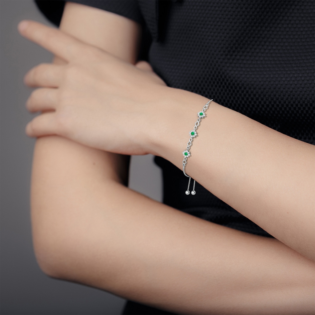 4mm AAA Infinity Emerald Station Bolo Bracelet with Floral Halo in White Gold Body-Bra