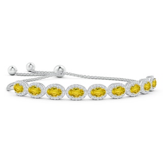 6x4mm AAAA Oval Yellow Sapphire Bolo Bracelet with Diamond Halo in White Gold