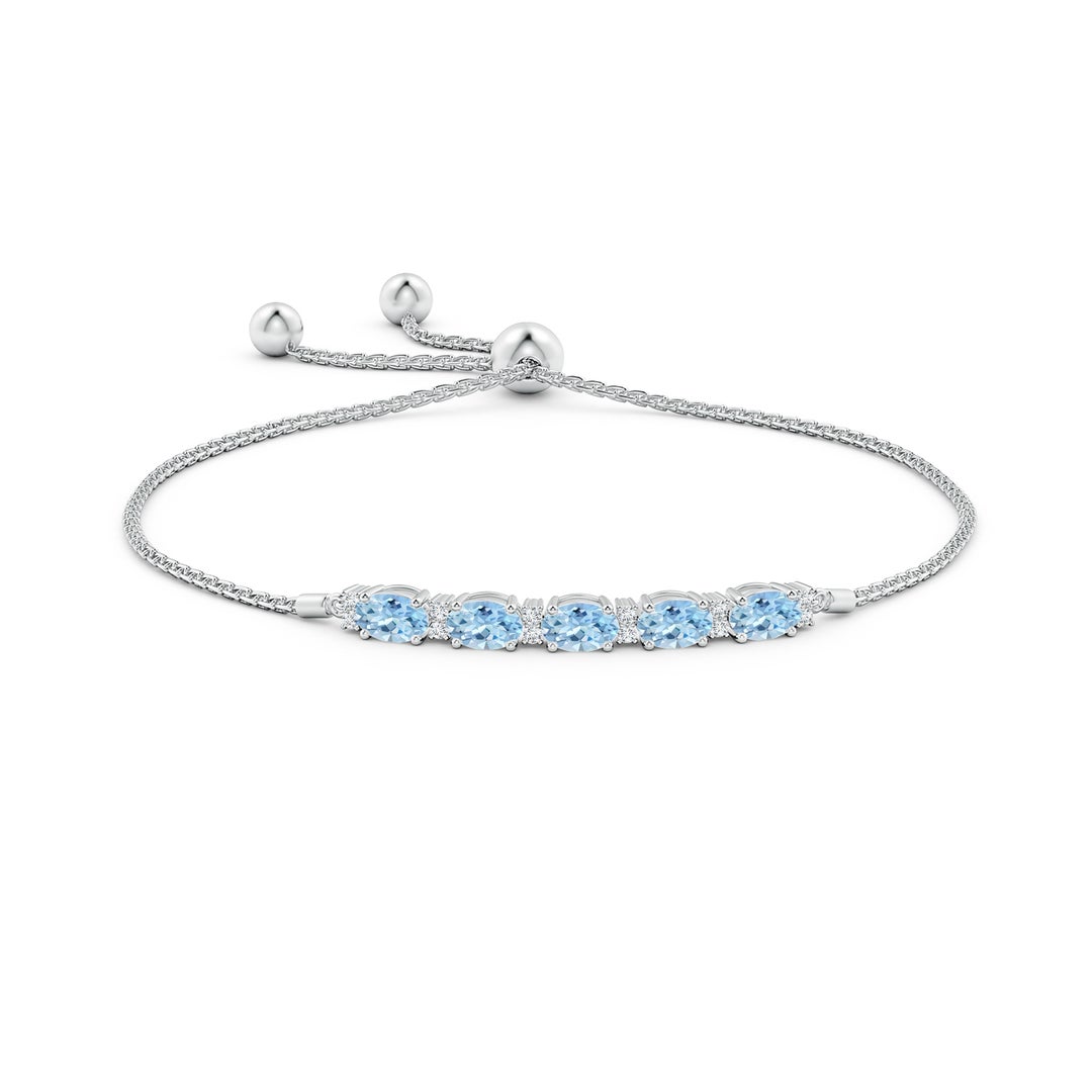 6x4mm AAA East-West Oval Aquamarine Bolo Bracelet with Diamonds in White Gold - side 1