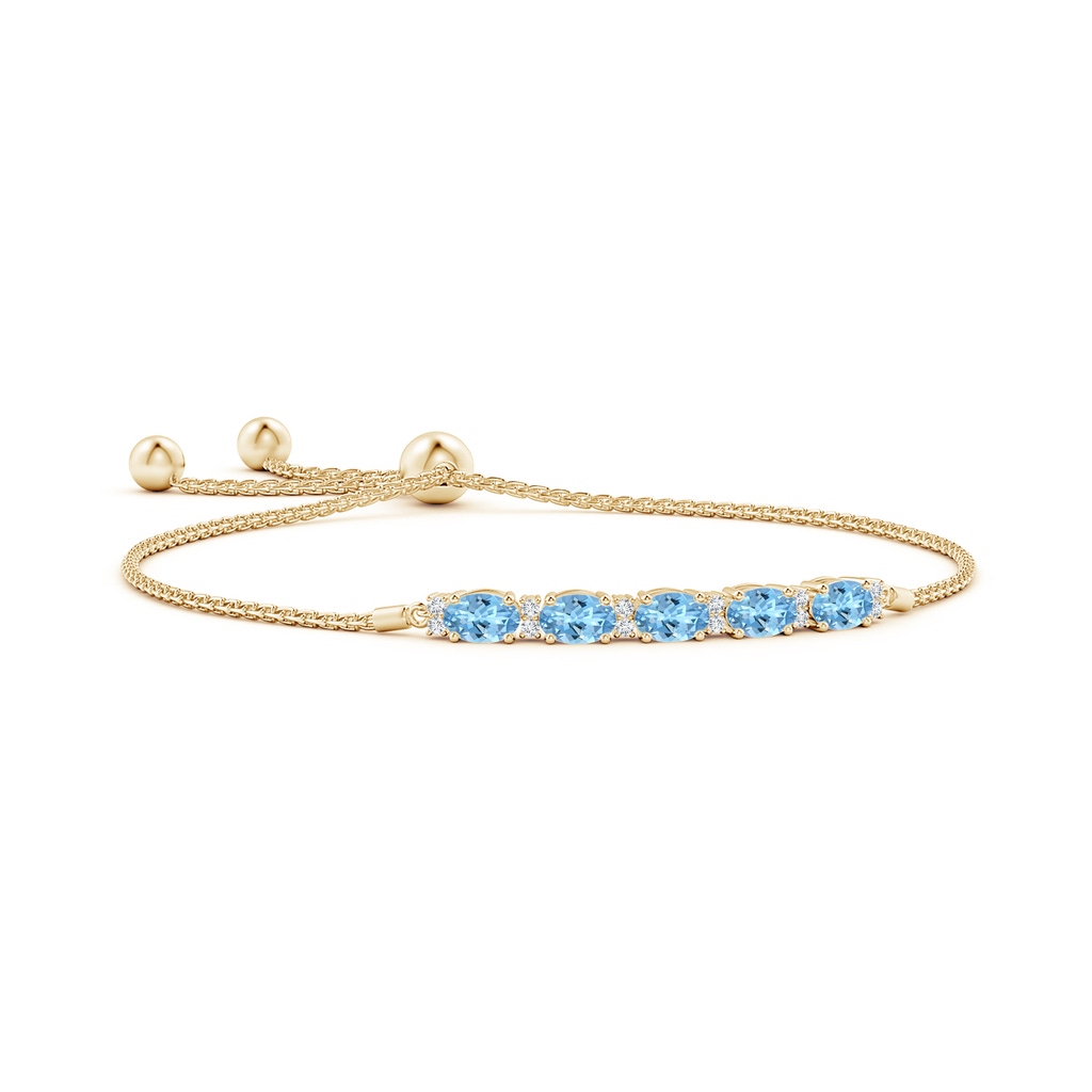 6x4mm AAAA East-West Oval Aquamarine Bolo Bracelet with Diamonds in Yellow Gold