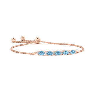 6x4mm A East-West Oval Swiss Blue Topaz Bolo Bracelet with Diamonds in Rose Gold