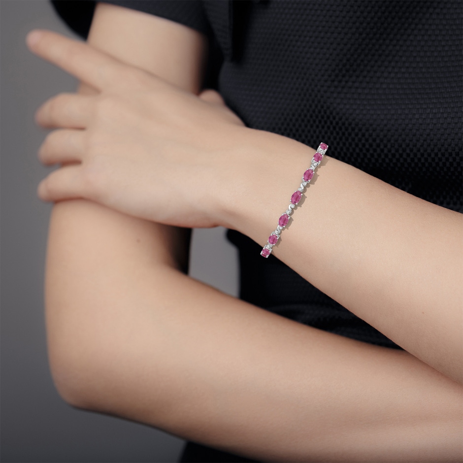 6x4mm AAA Oval Pink Tourmaline Swirl Bracelet with Bezel Diamonds in White Gold body-hand