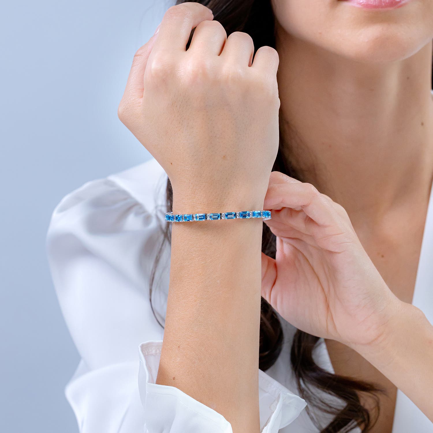 Classic Emerald-Cut Swiss Blue Topaz Bracelet with Diamonds