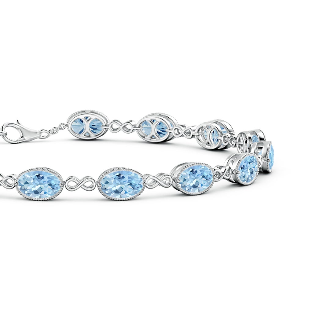 6x4mm AAA Oval Aquamarine Infinity Link Bracelet with Milgrain in White Gold - side 1