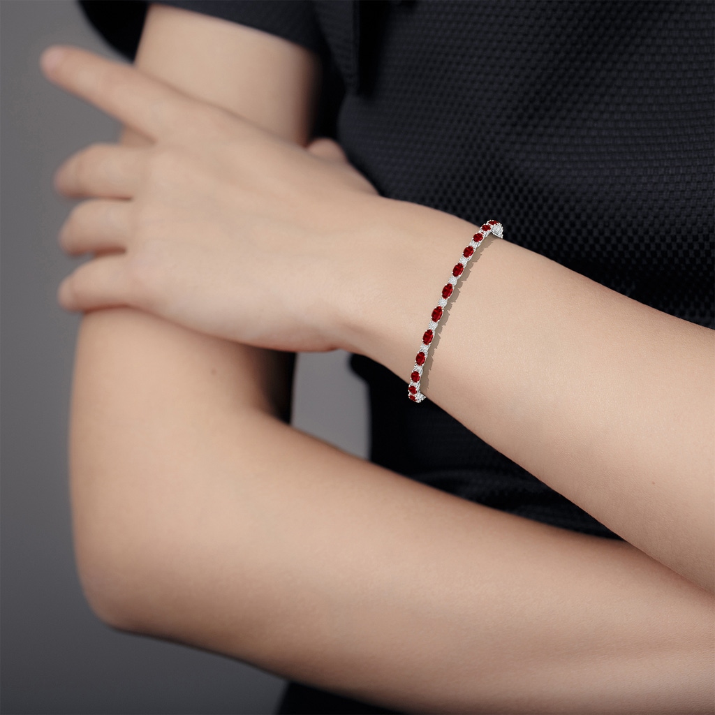 5x3mm Lab-Grown Oval Ruby Tennis Bracelet with Gypsy Diamonds in White Gold - body_hand