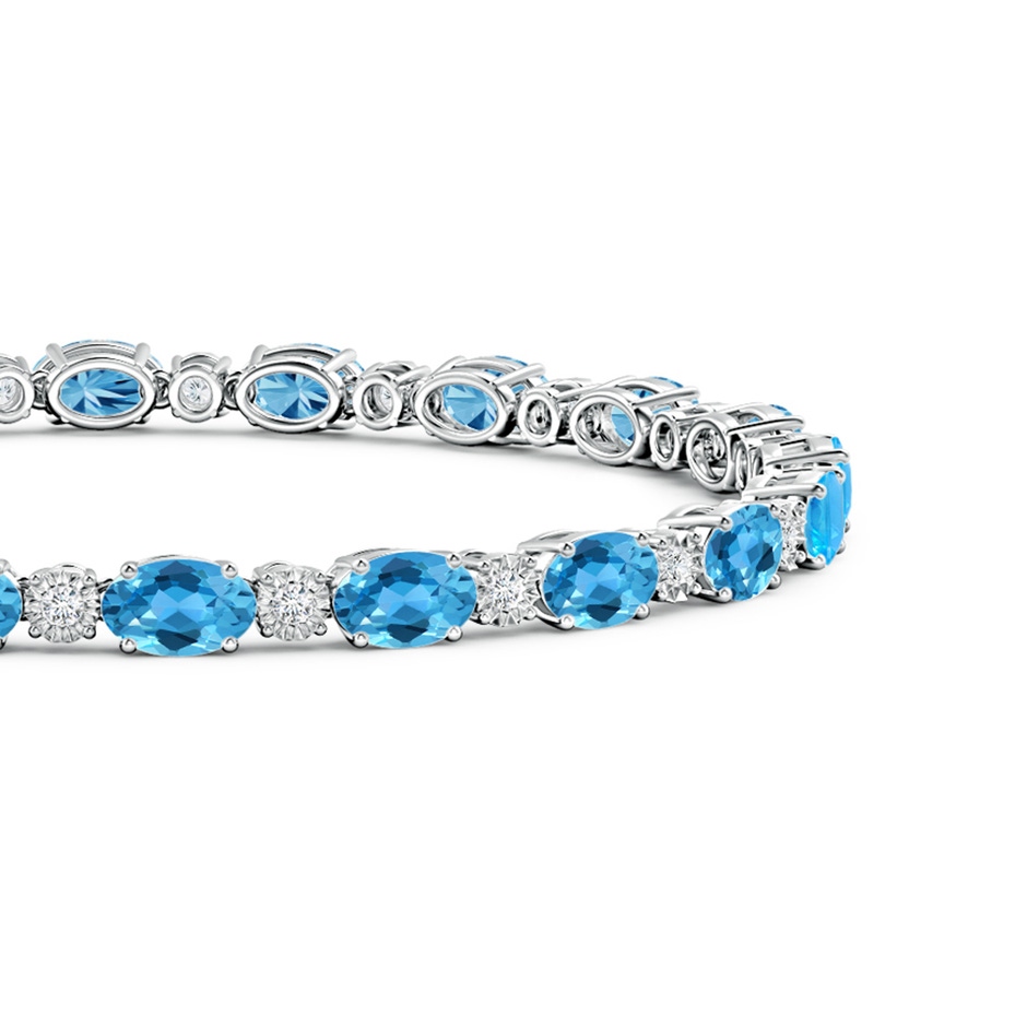 6x4mm AAA Oval Swiss Blue Topaz Tennis Bracelet with Gypsy Diamonds in White Gold side 1