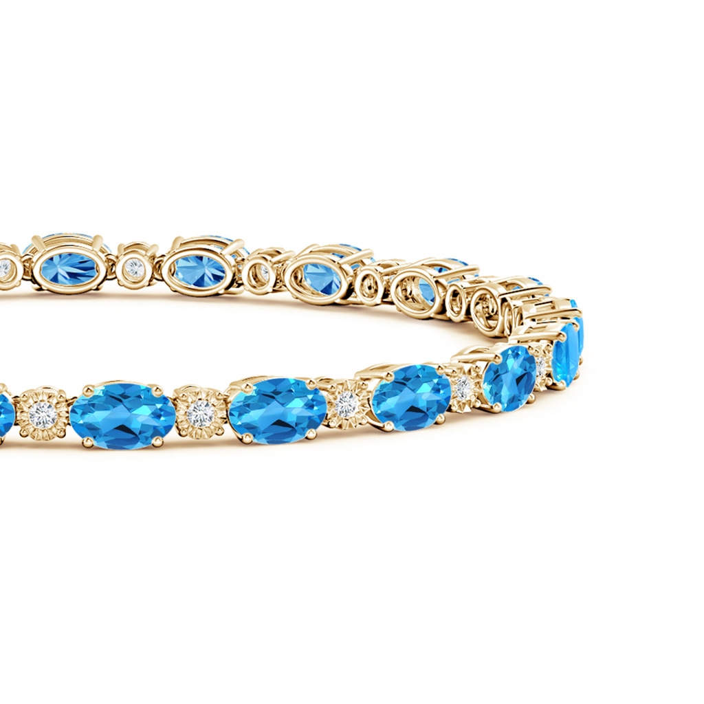 6x4mm AAAA Oval Swiss Blue Topaz Tennis Bracelet with Gypsy Diamonds in Yellow Gold Side 1