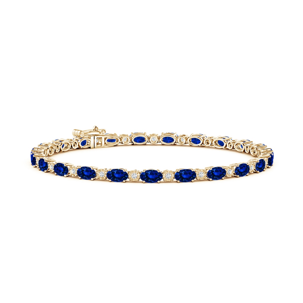 5x3mm AAAA Oval Sapphire Tennis Bracelet with Gypsy Diamonds in Yellow Gold
