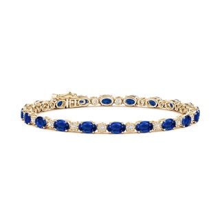 6x4mm AAA Oval Sapphire Tennis Bracelet with Gypsy Diamonds in Yellow Gold