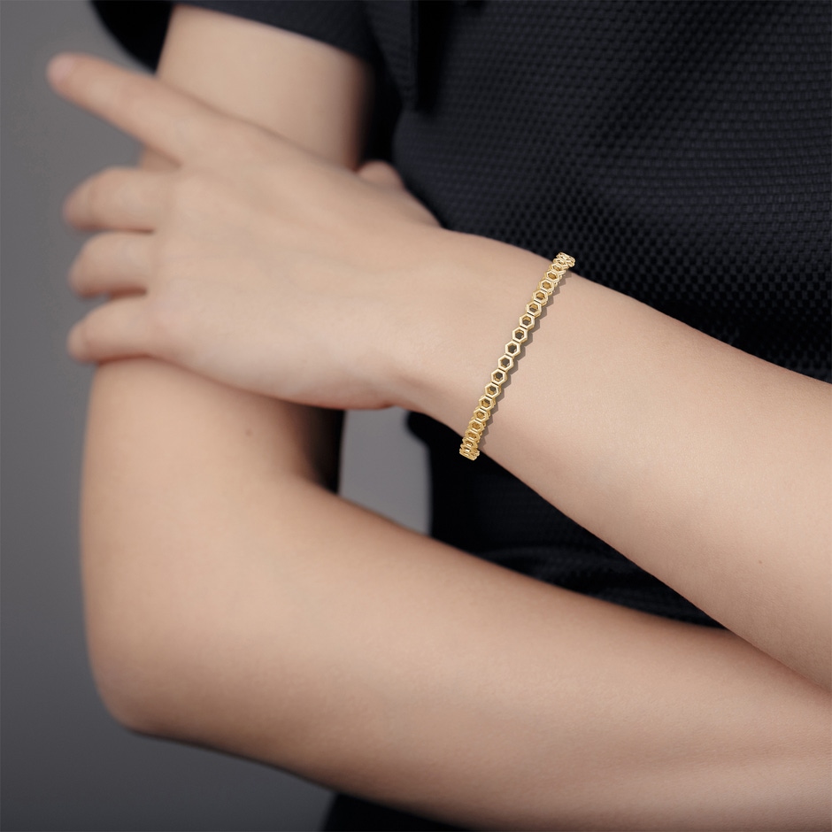 70 Bracelet Catch Open Hexagon Link Bracelet in Yellow Gold body-hand