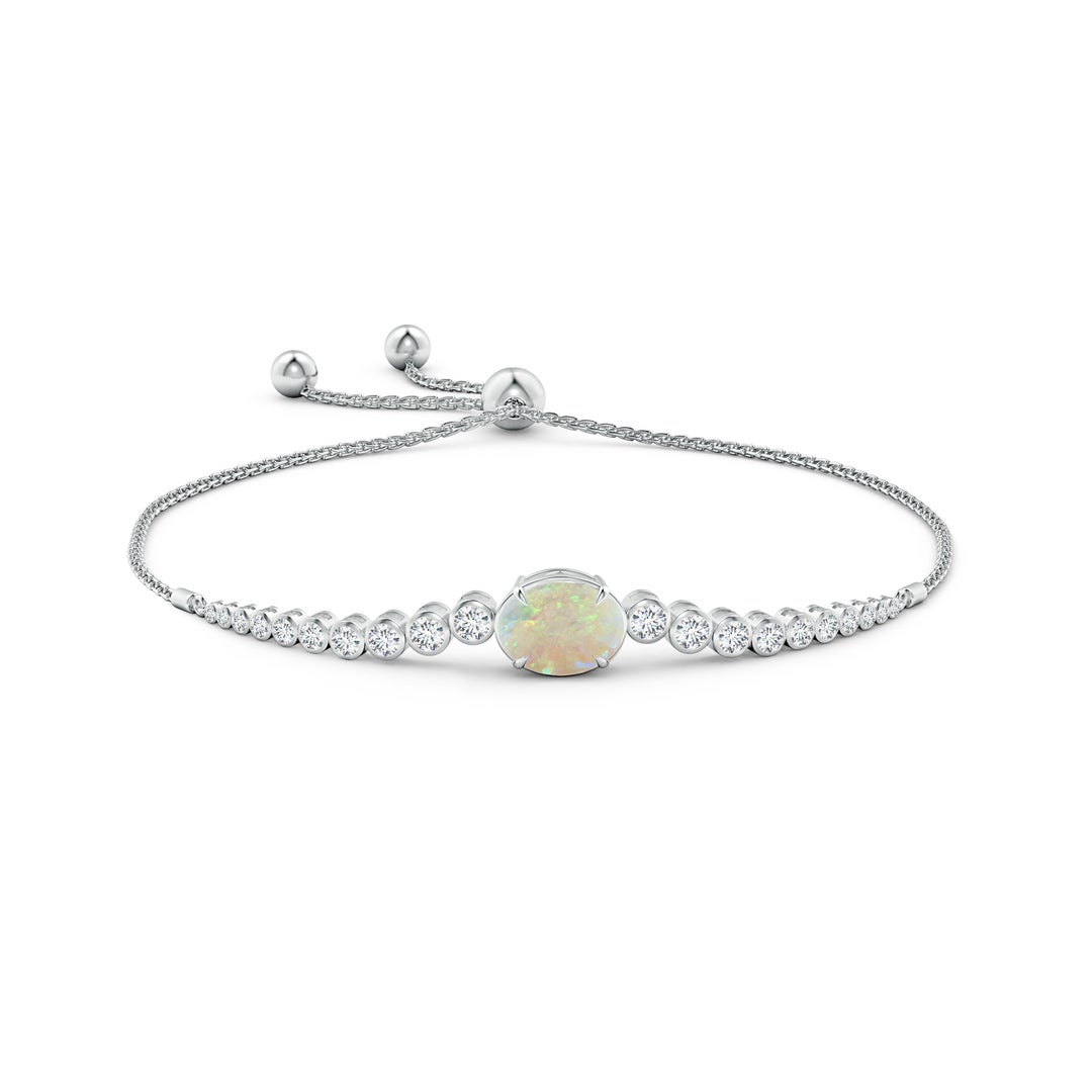 10x8mm AAA Oval Opal Bolo Bracelet with Bezel Diamonds in White Gold - side 1