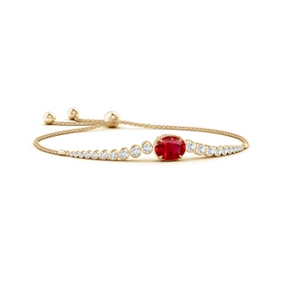 10x8mm AAA Oval Ruby Bolo Bracelet with Bezel Diamonds in Yellow Gold