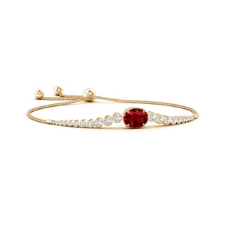 10x8mm AAAA Oval Ruby Bolo Bracelet with Bezel Diamonds in 9K Yellow Gold