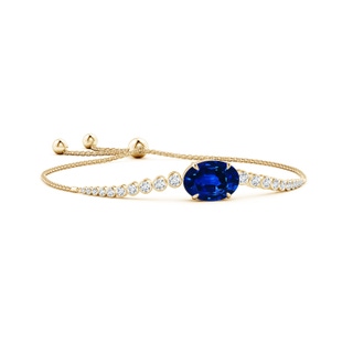 14x10mm Lab-Grown Oval Sapphire Bolo Bracelet with Bezel Diamonds in Yellow Gold