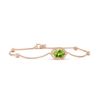 9x7mm AAA Vintage Style Oval Peridot and Diamond Leo Station Bracelet in 9K Rose Gold