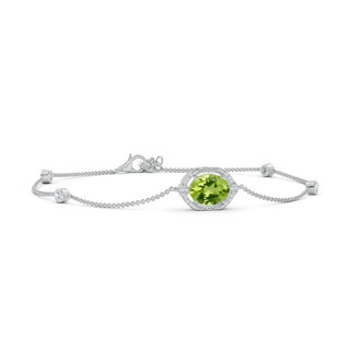 9x7mm AAA Vintage Style Oval Peridot and Diamond Leo Station Bracelet in White Gold