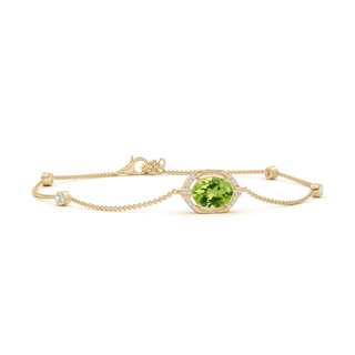 9x7mm AAA Vintage Style Oval Peridot and Diamond Leo Station Bracelet in Yellow Gold