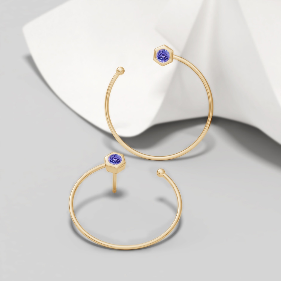 3mm AAA Natori x Angara Small Hexagonal Tanzanite Open Hoops in Yellow Gold lifestyle