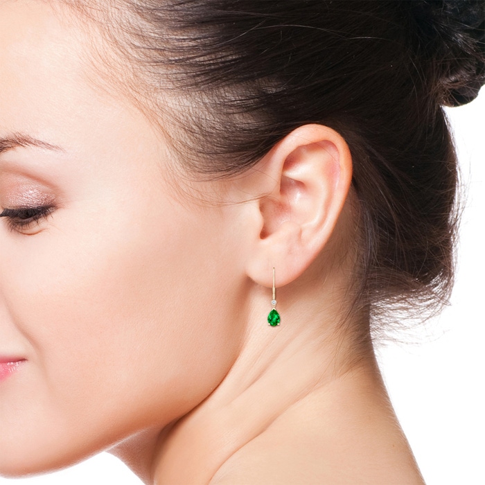 7x5mm AAAA Pear-Shaped Emerald Leverback Drop Earrings with Diamond in Yellow Gold ear