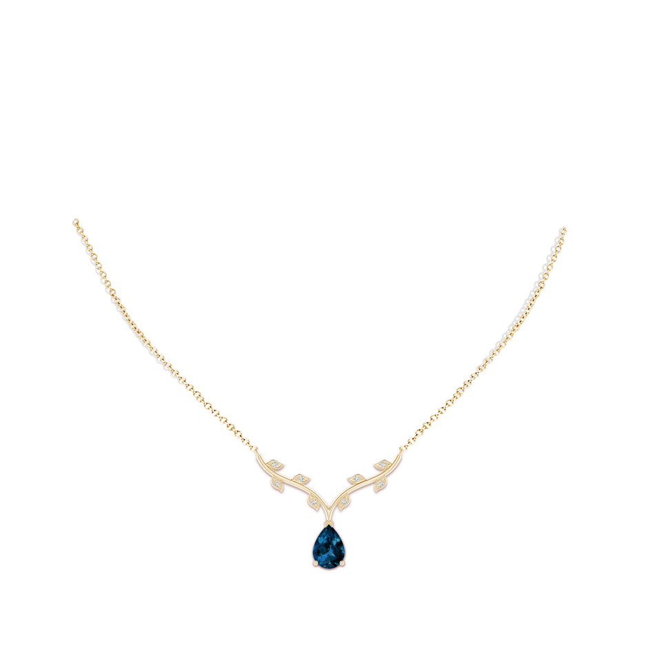 10x7mm AAAA Pear-Shaped London Blue Topaz Necklace with Leaf Motifs in 18K Yellow Gold pen