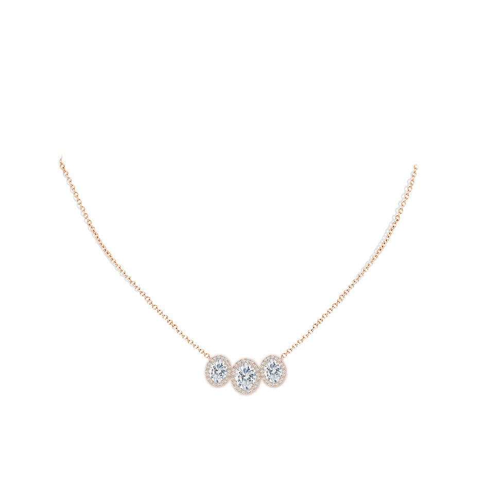 9x7mm FGVS Lab-Grown Three Stone Oval Diamond Halo Pendant in Rose Gold pen