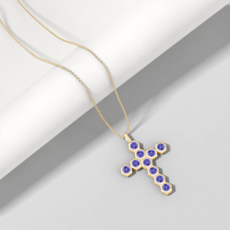 3mm AAA Natori x Angara Hexagonal Tanzanite Cross Pendant in Yellow Gold lifestyle