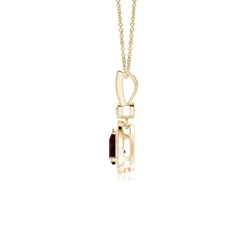 6x4mm A Pear-Shaped Garnet and pave Diamond Halo Pendant in Yellow Gold side-1