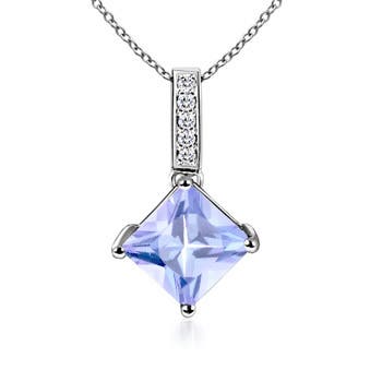 A - Tanzanite / 0.78 CT / 14 KT White Gold