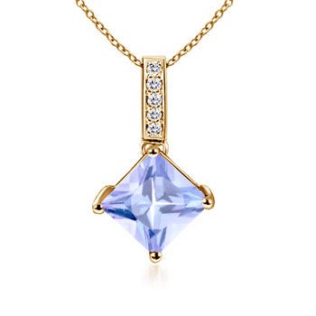 A - Tanzanite / 0.78 CT / 14 KT Yellow Gold