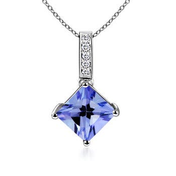 AA - Tanzanite / 0.78 CT / 14 KT White Gold