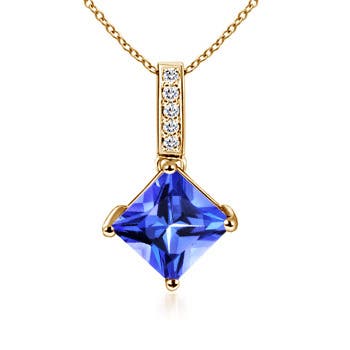 AAA - Tanzanite / 0.78 CT / 14 KT Yellow Gold