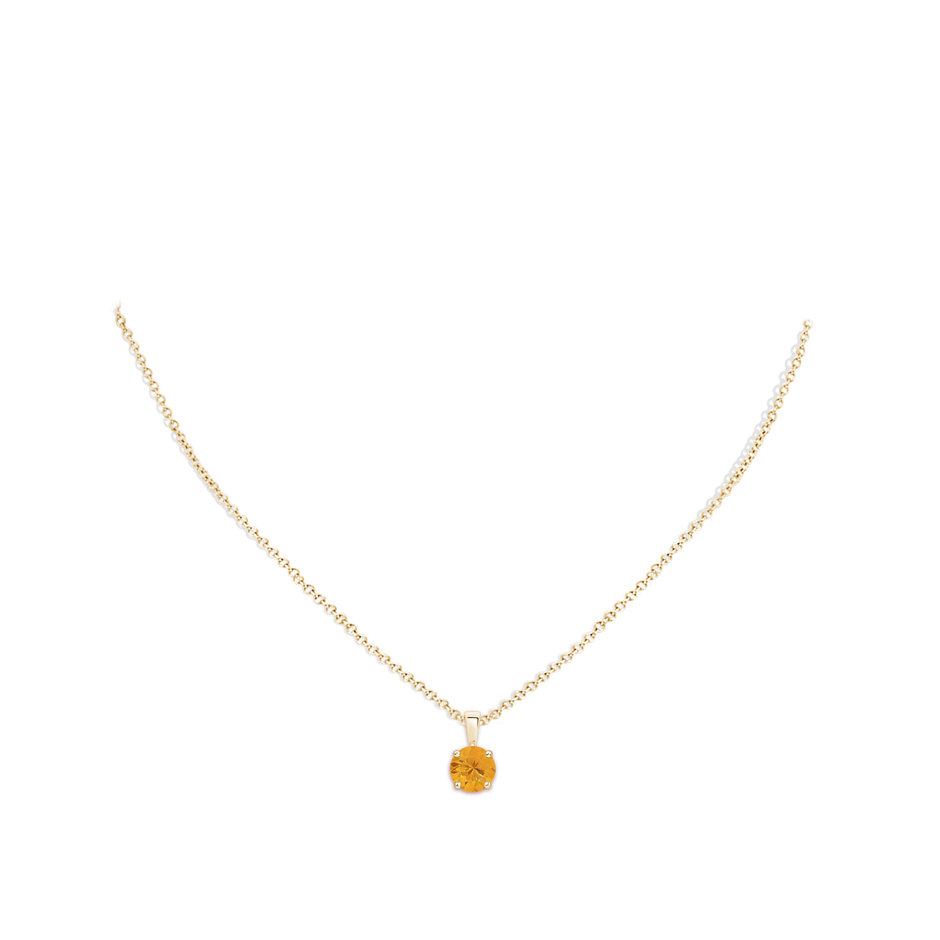 7mm A Classic Prong-Set Round Fire Opal Solitaire Pendant in Yellow Gold pen