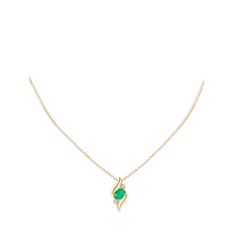 8x6mm A Shell Style Oval Emerald and Diamond Pendant in Yellow Gold pen