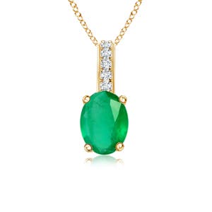 A - Emerald / 0.43 CT / 14 KT Yellow Gold