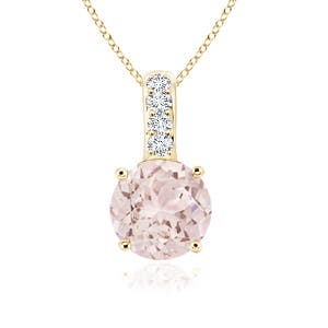 A - Morganite / 0.44 CT / 14 KT Yellow Gold