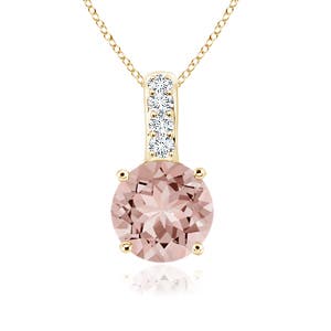 AAAA - Morganite / 0.44 CT / 14 KT Yellow Gold